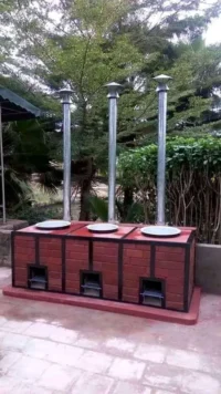 WhatsApp (9) (1) Triple Institutional Rocket Stove with Chimneys(Without Sufurias)